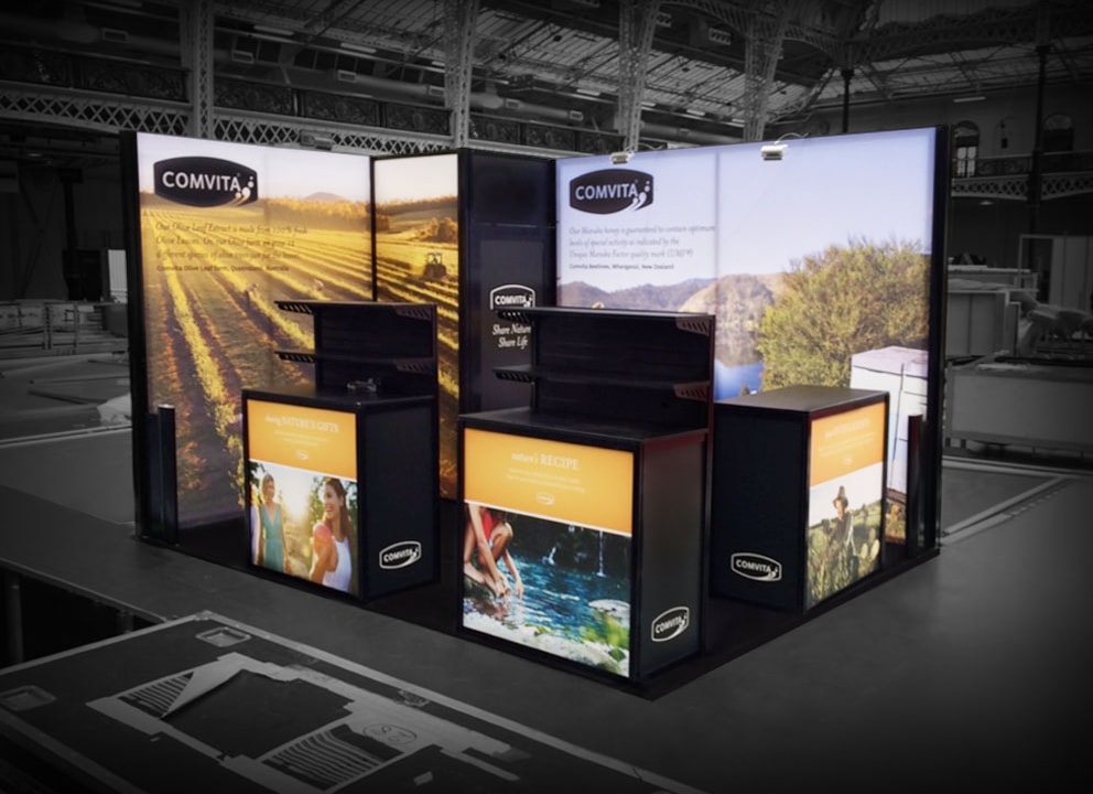 Trade show booth using backlit signs