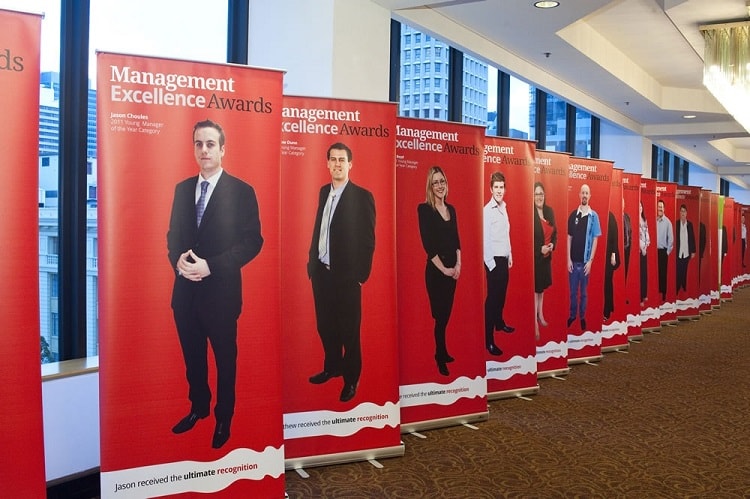 A row of pull up banners at a conference